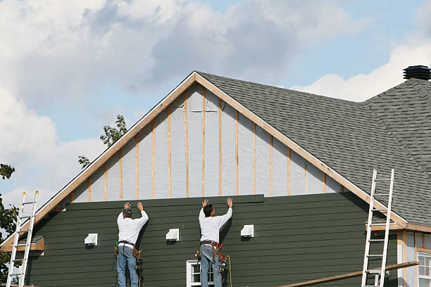 Professional Siding technician working in Columbus, NC
